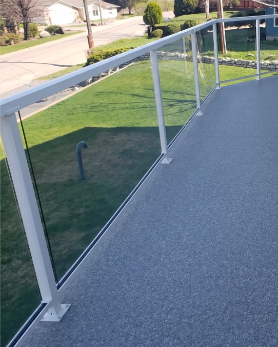 Waterproof vinyl deck flooring installation showing membrane application and edge sealing