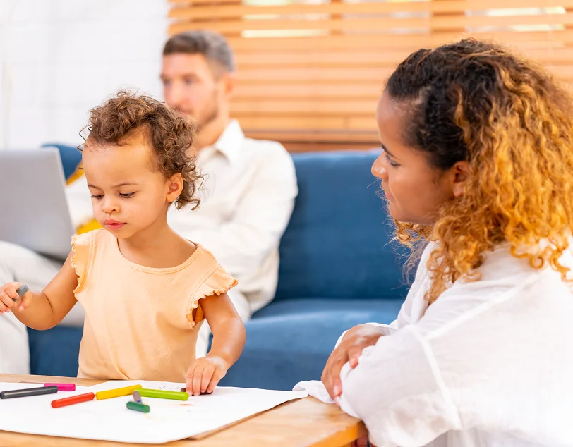 Family participating in autism therapy in Surprise with therapist support