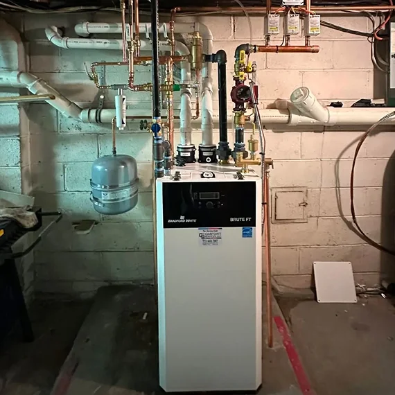 Technician restoring a home heating system