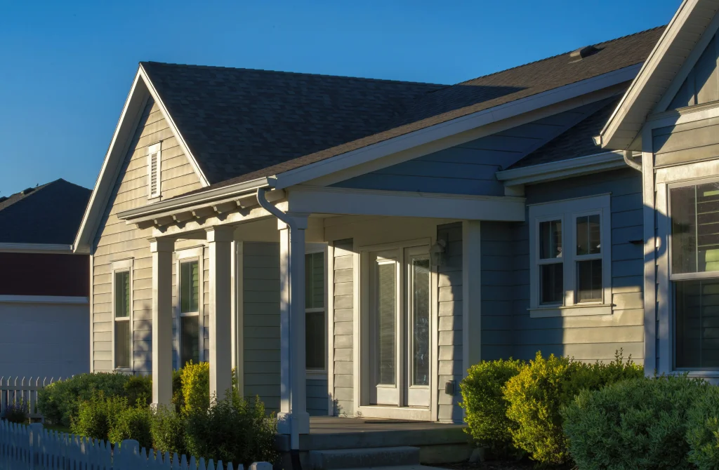 A financial consultant discussing homeownership goals with a family in Canada.
