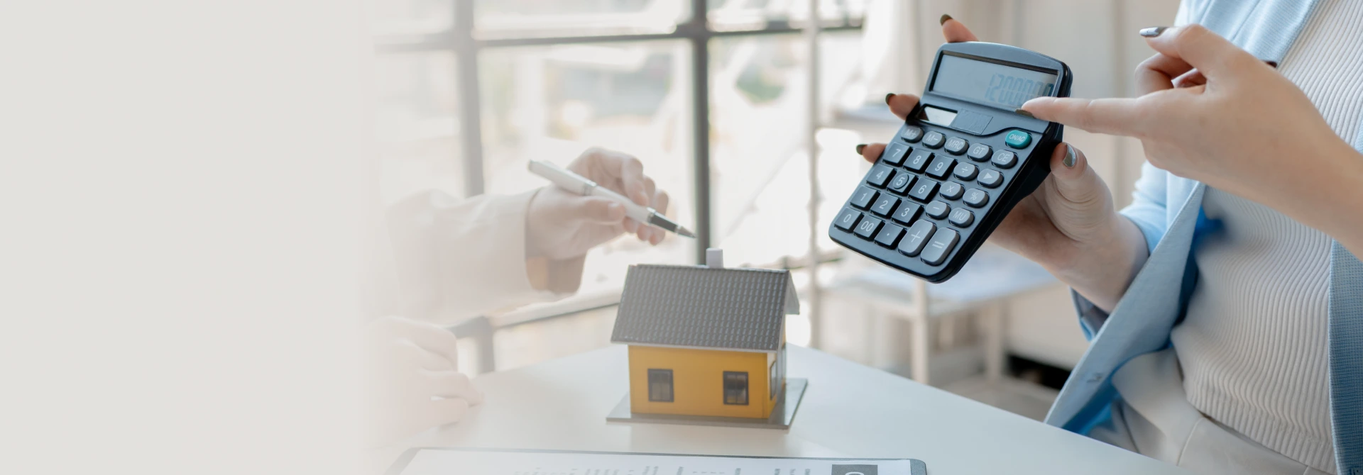 A family exploring Alternative Home Financing options with an advisor.