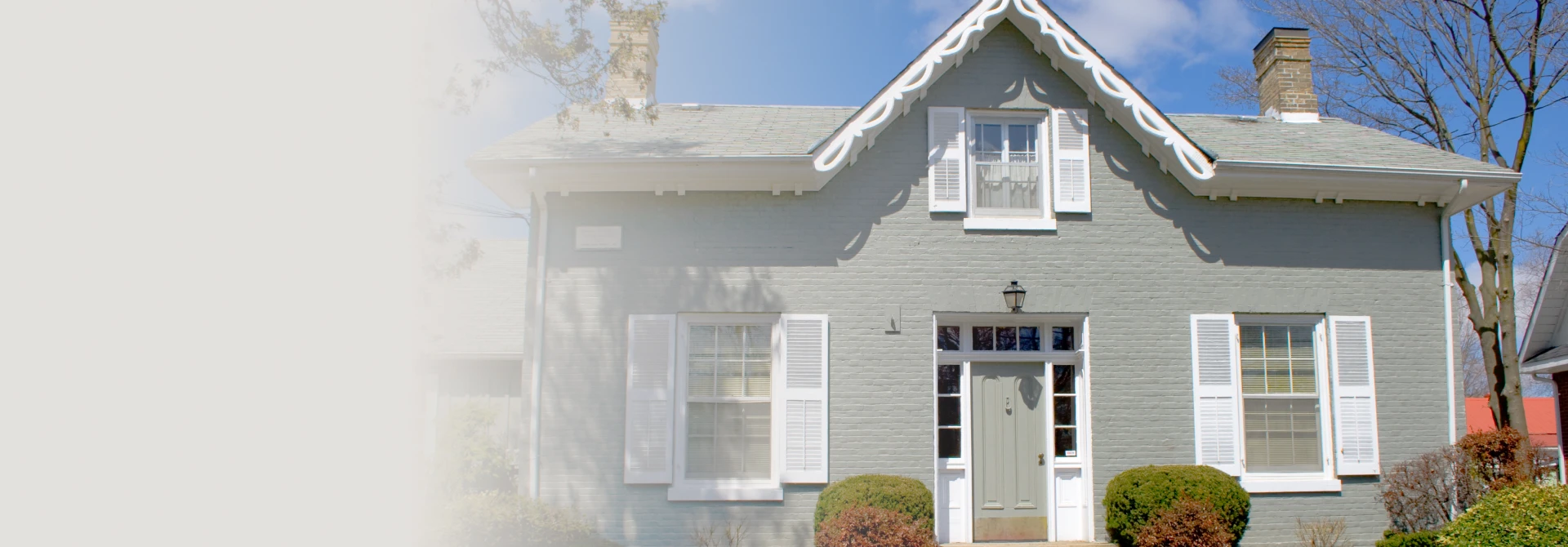 Family standing outside a home during the home buying process
