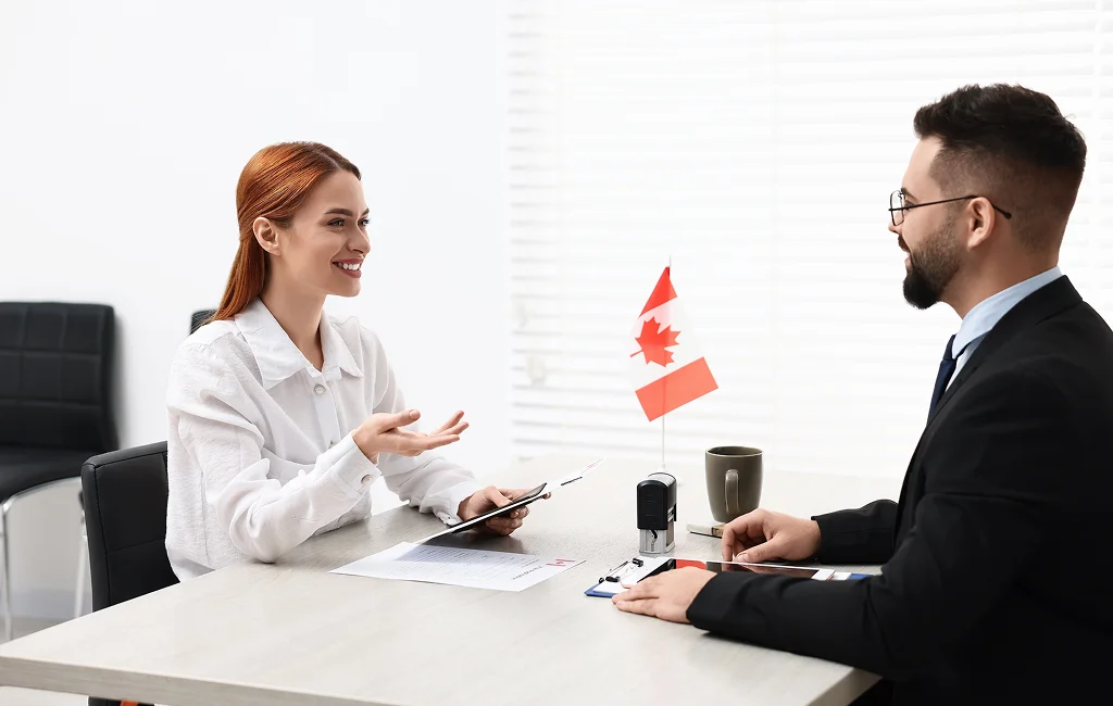 Canadian immigration consultants meeting with clients in Winnipeg