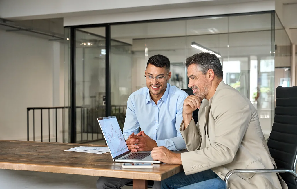 Accounting professionals collaborating during a client meeting