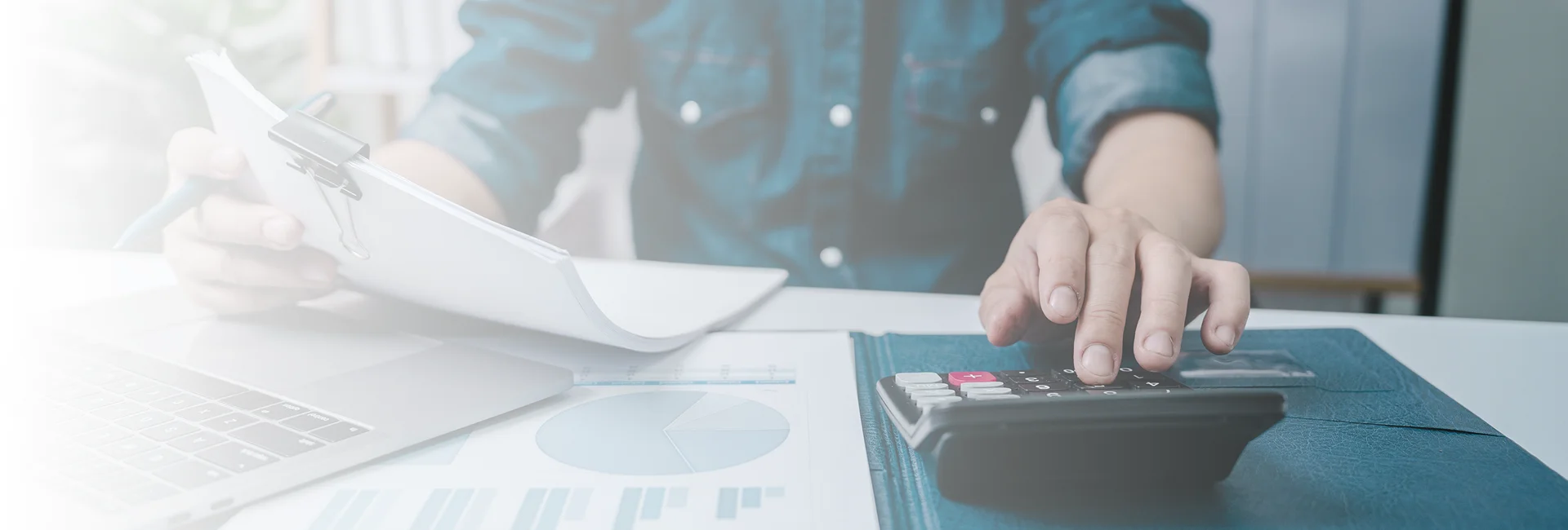 Business owner comparing bookkeeping packages for company needs