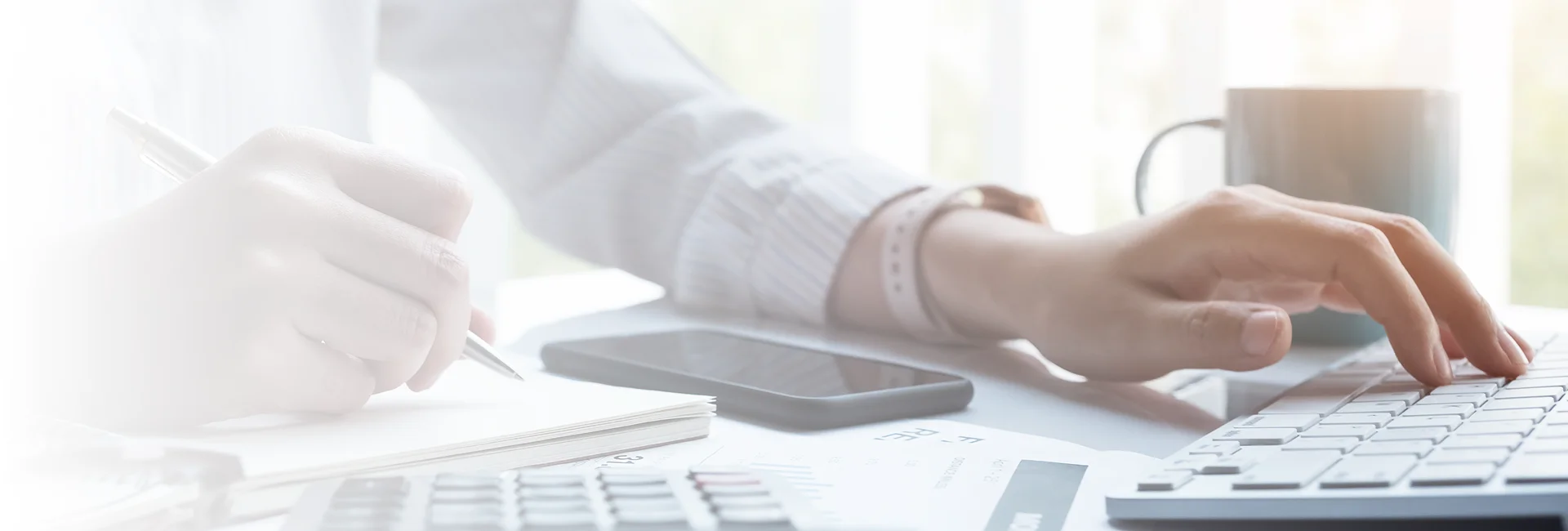 Client reviewing accounting services in Calgary with a financial professional