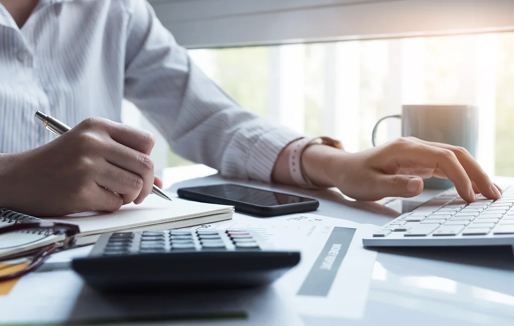 Client reviewing accounting services in Calgary with a financial professional