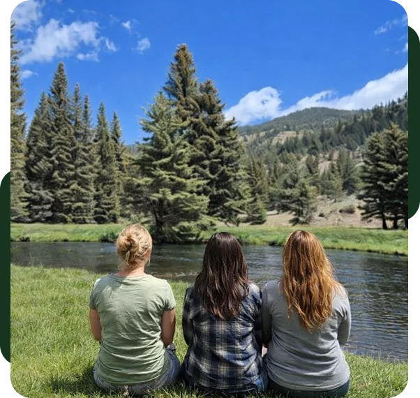 A life & wellness coach in Albuquerque welcomes a client into a comfortable office.
