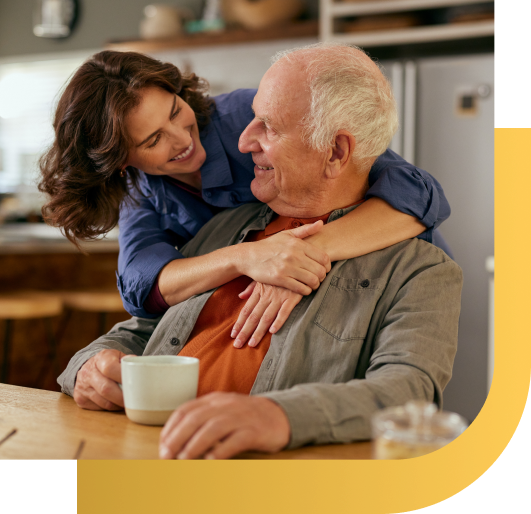 Caregiver providing shower assistance for elderly adult