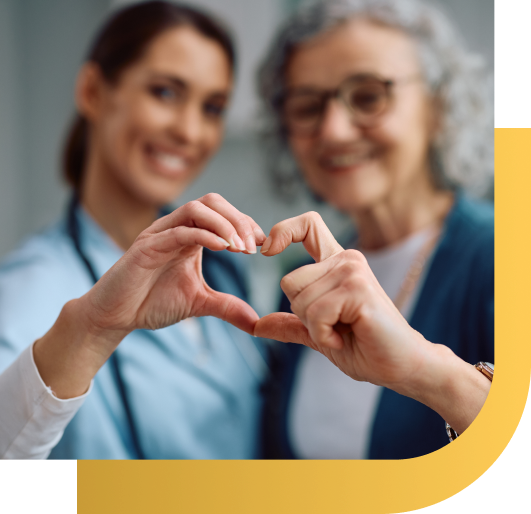 Caregiver helping senior at home in Hudsonville