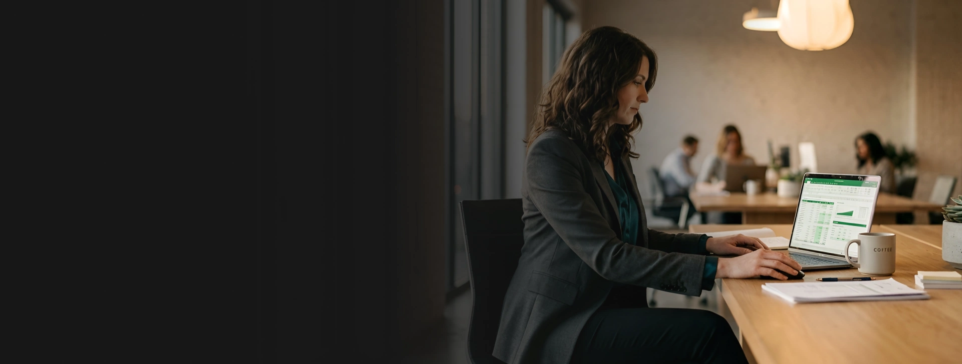 Executive reviewing forecasts with a virtual CFO services advisor