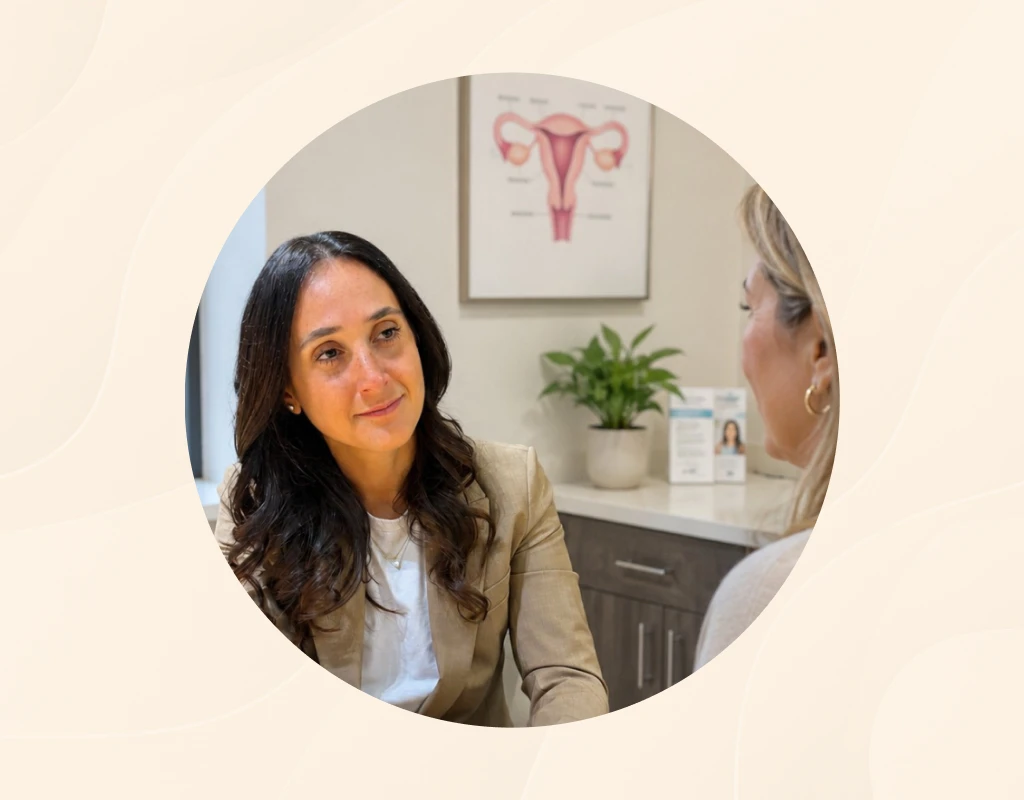Certified OBGYN in NYC meeting with a patient in a welcoming office.