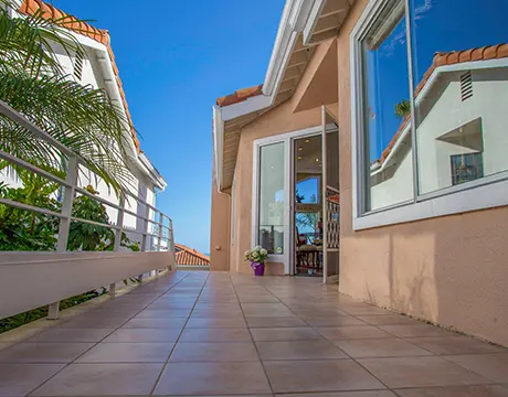 Luxury property videographer filming a coastal home in Newport Beach