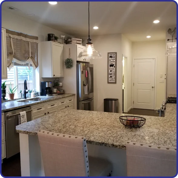 Residential kitchen rebuilding services restoring a fire-damaged kitchen.