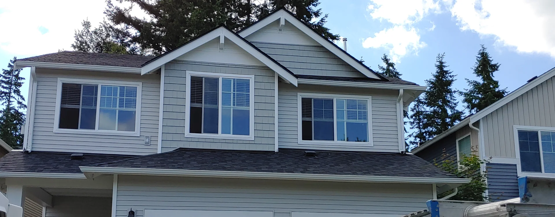 Roof repair services in Seattle, WA, restoring a storm-damaged roof.