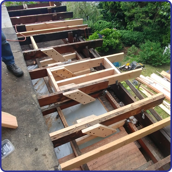 Reconstruction services repairing structural damage after an unexpected disaster.