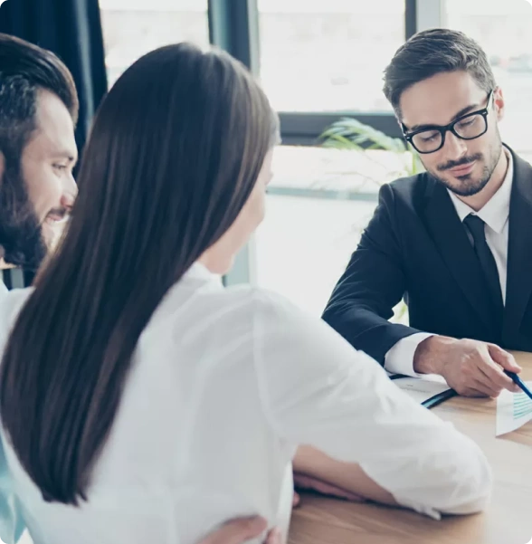 A family law lawyer in Toronto meets with a client in a private office.