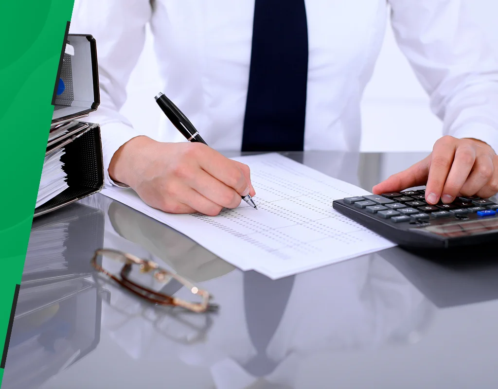 Small business accounting services professional reviewing financial records