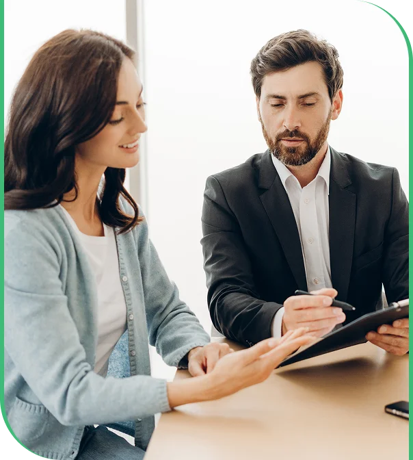 Licensed bookkeepers reviewing financial reports on a laptop