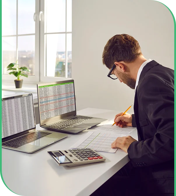 Financial team reviewing reports at an outsourced bookkeeping firm
