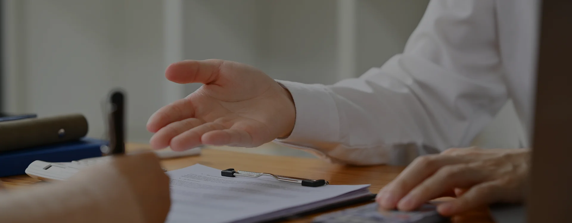 Payroll specialist reviewing employee records for payroll services