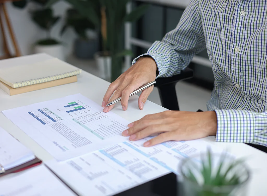 Franchise owner reviewing reports for franchise bookkeeping services