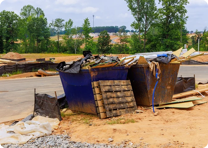 E-waste removal crew collecting unwanted computers from an office