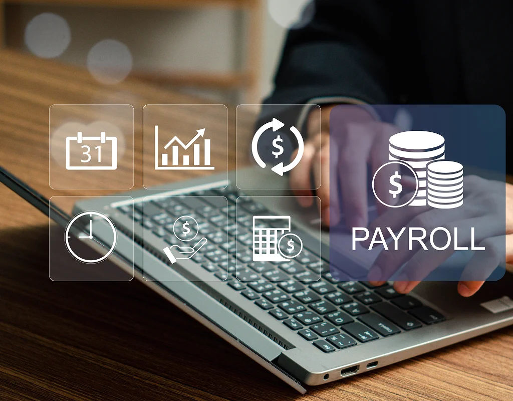Payroll services professional reviewing employee payroll records