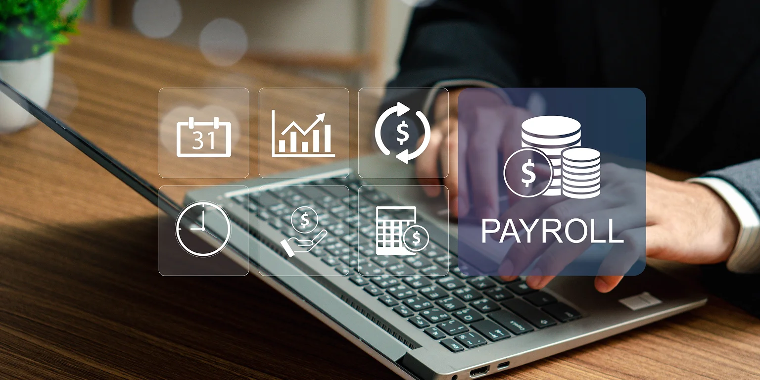 Payroll services professional reviewing employee payroll records