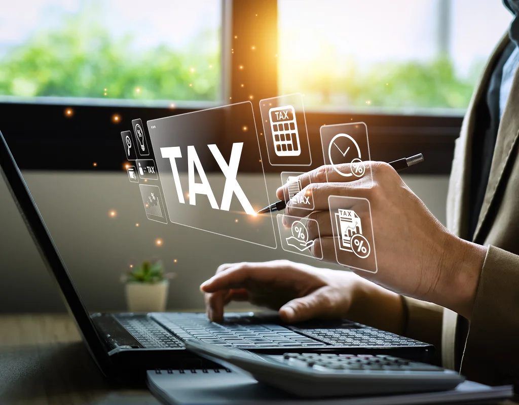 Tax preparation professional reviewing business tax documents
