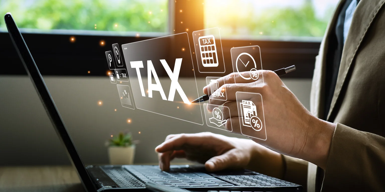 Tax preparation professional reviewing business tax documents