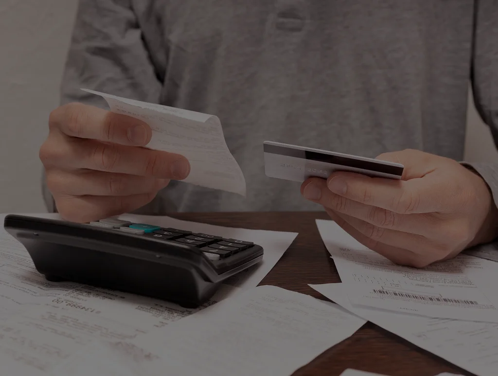 Bookkeeper comparing statements during bank reconciliation services