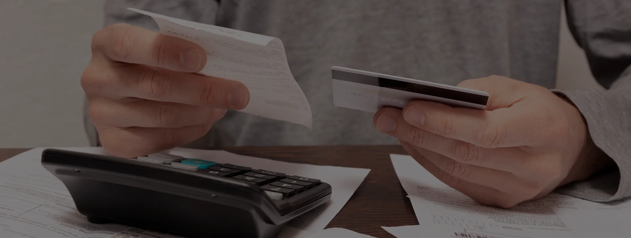 Bookkeeper comparing statements during bank reconciliation services