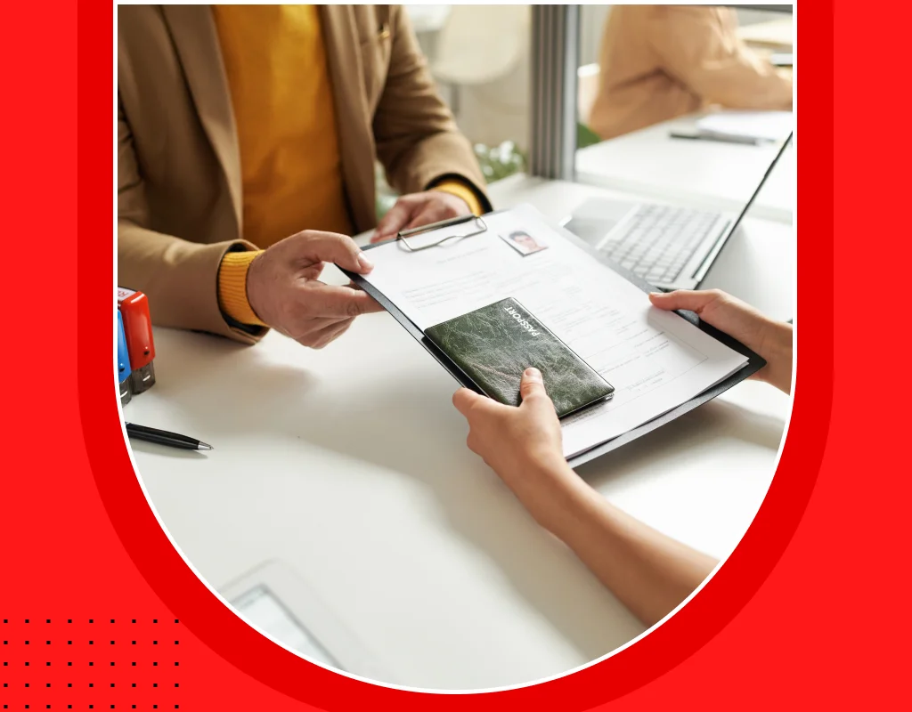 Consultant reviewing Canadian work permits with an applicant